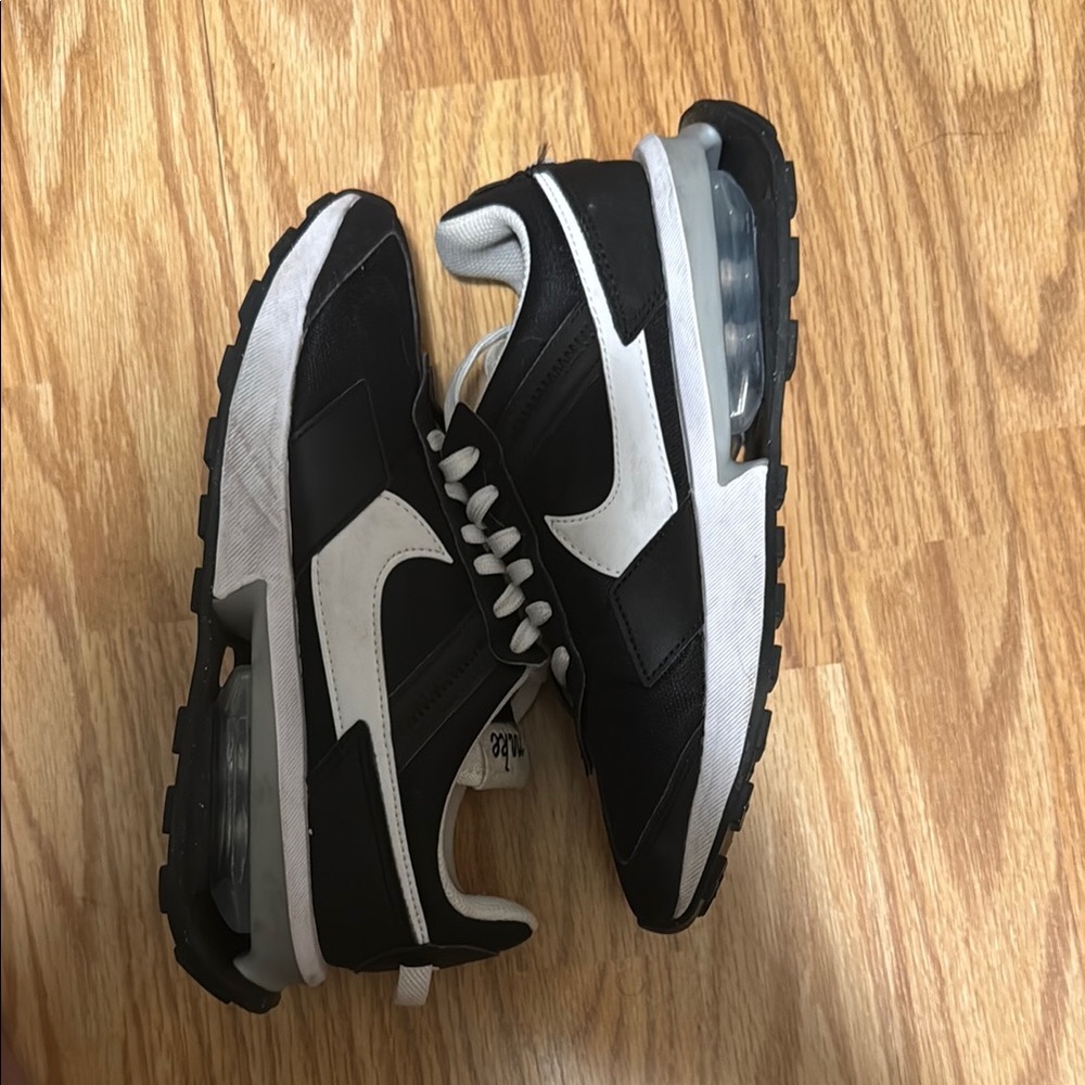 Women’s Black and White Nike Sneakers